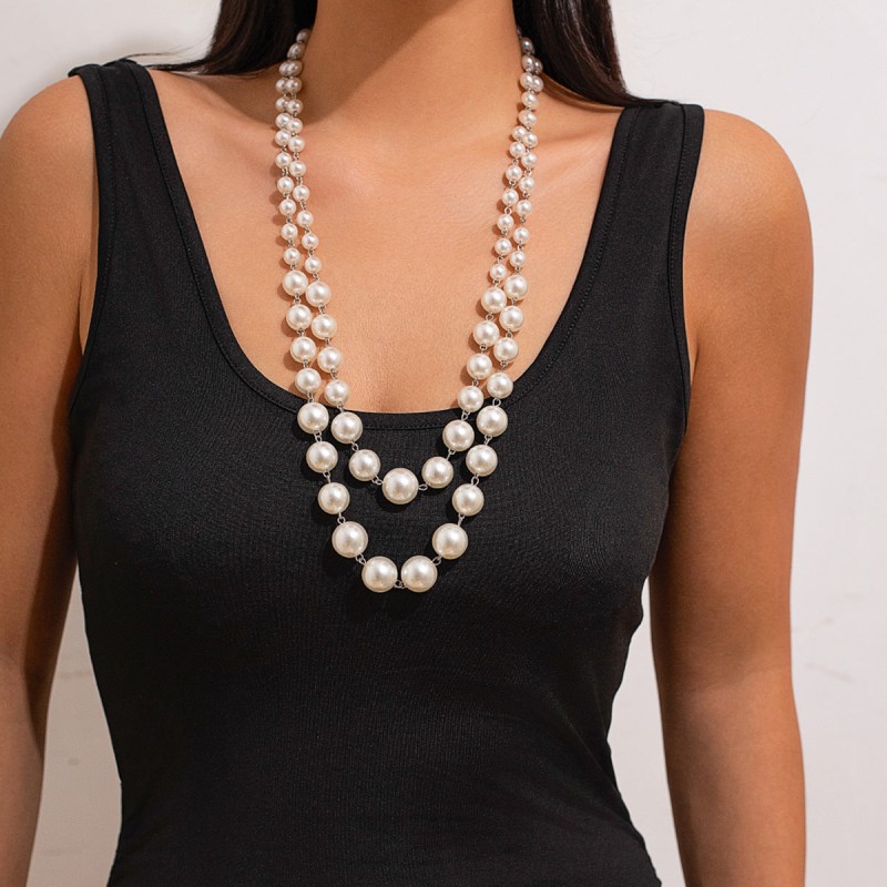 Elegant Jewelry Featuring Dual Lustrous Pearls and...