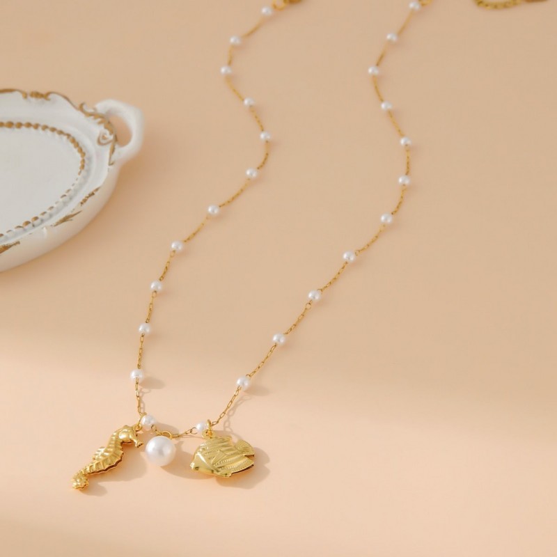 A Unique and Elegant Jewelry Piece Combining Nautical Charm with Sparkling Starfish Details for a Coastal-Inspired